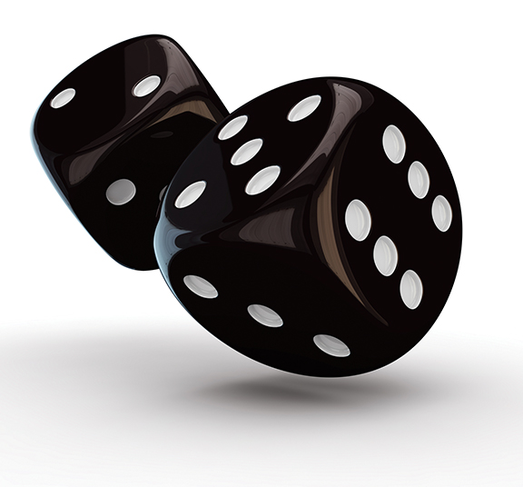 Two black dice with white dots tumbling through the air, casting a shadow on a white surface.