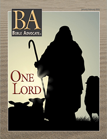 Silhouette of shepherd with sheep on Bible Advocate cover titled One Lord, January-February 2015 issue.
