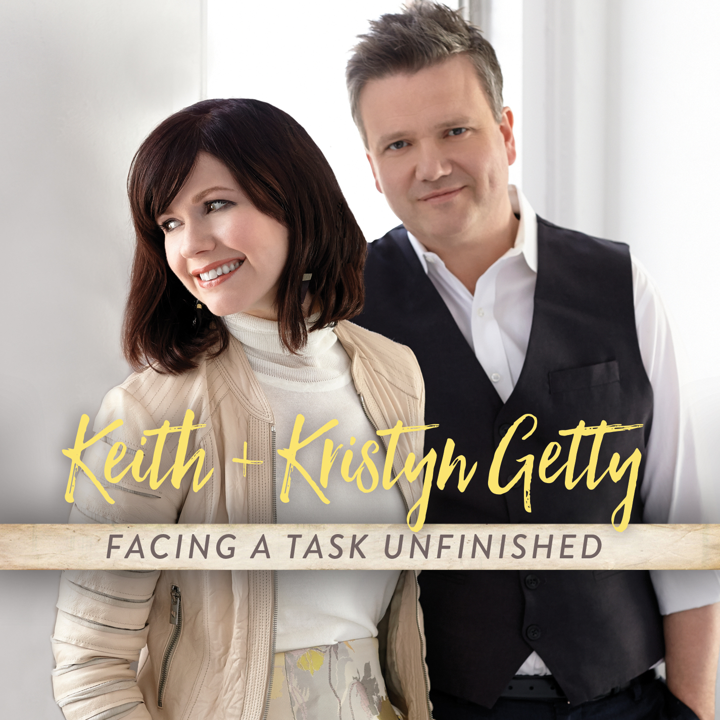 Album cover featuring two individuals with the text Keith + Kristyn Getty: Facing a Task Unfinished.