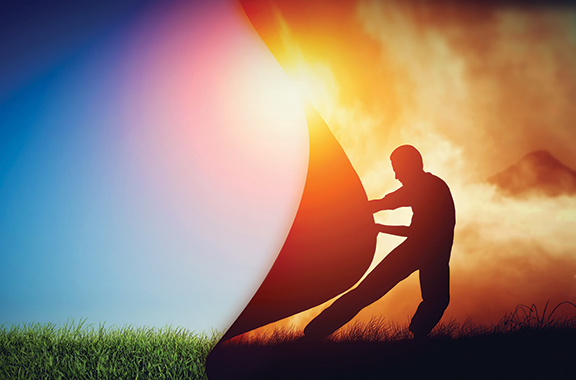 Person unveiling a bright sunrise, shifting from dark to light, symbolizing change and new beginnings.