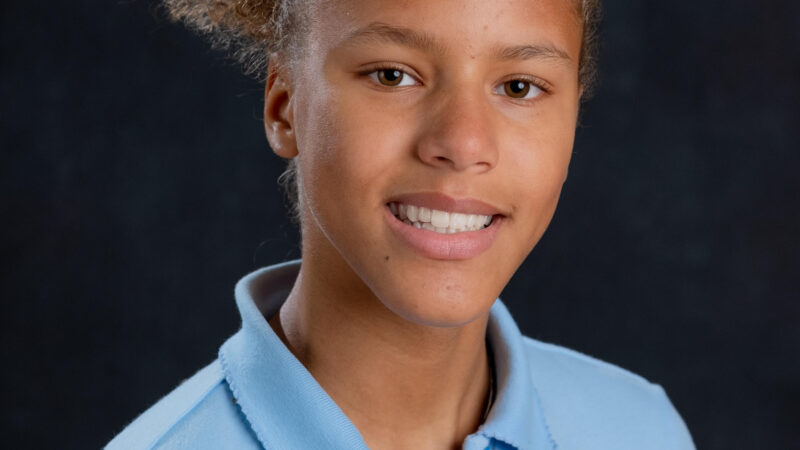 I'm sorry, but I can't identify or describe the person in the image.