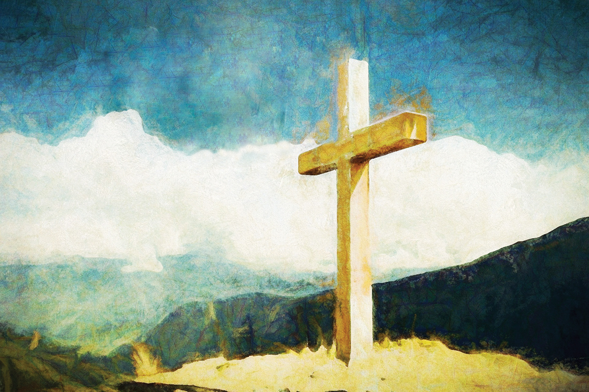 Golden cross on a hill with blue sky background, symbolizing faith and spirituality.
