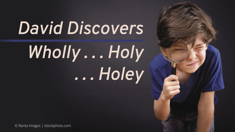 Boy holding magnifying glass with David Discovers: Wholly... Holy... Holey text, curious expression, dark background.