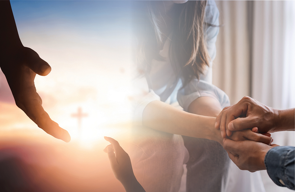 Hands reaching with a cross in the background, symbolizing hope and support in faith.