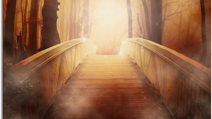 Enchanted wooden bridge in foggy forest with glowing sunlight at dawn.