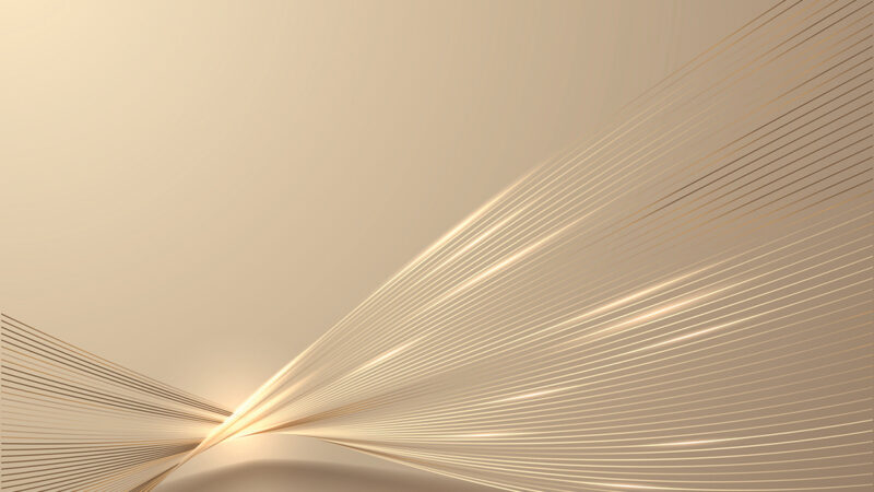 Abstract beige and gold linear wave design with light reflections.