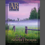AB Audio (Español) Magazine cover displaying a misty field and wildflowers, titled Alabanza y Preceptos, with a nature theme.