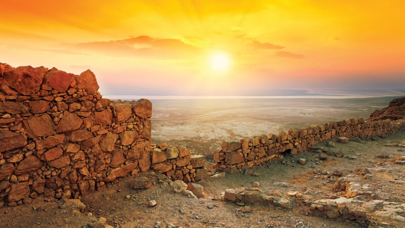 Beautiful sunrise over Masada fortress in Judaean Desert