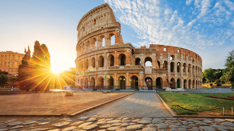 Colosseum in Rome and morning sun, Italy
